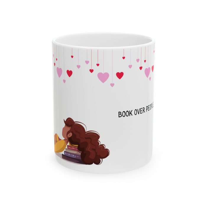 White ceramic mug with illustration of a woman reading and quote “Book Over People, Always” – gift mug for book lovers and introverts.