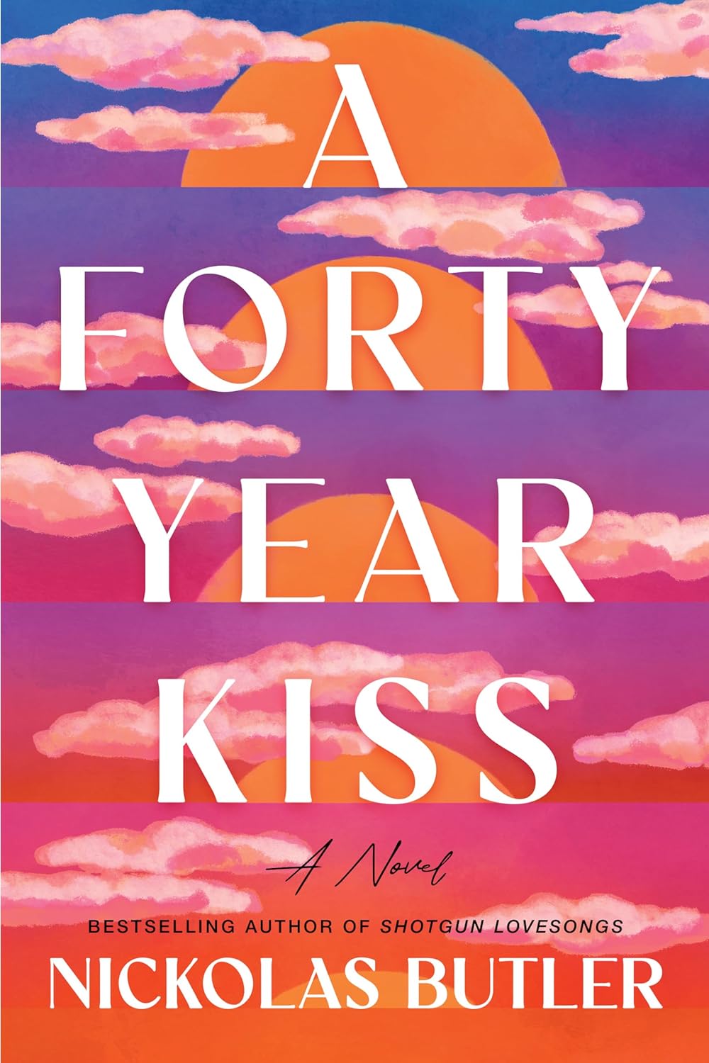 Book cover of "A Forty-Year Kiss" by Nickolas Butler, featuring two silhouetted figures standing apart on a quiet, rural road at sunset, surrounded by trees and soft golden light.