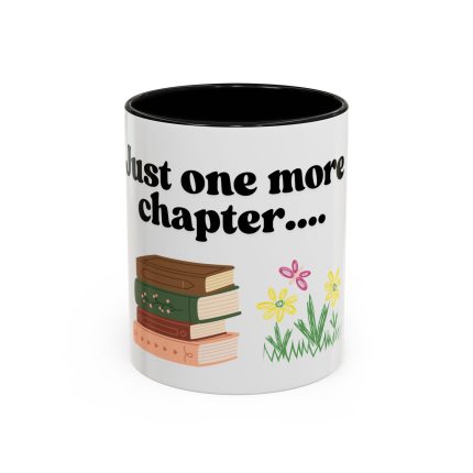 Colorful ceramic book lover mug with stack of books, flowers, and the quote “Just One More Chapter” printed on it. Interior of the mug is black.