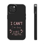 Phone case showing a girl reading on her stomach with pink text above that reads “I Can’t, I Am Busy.”