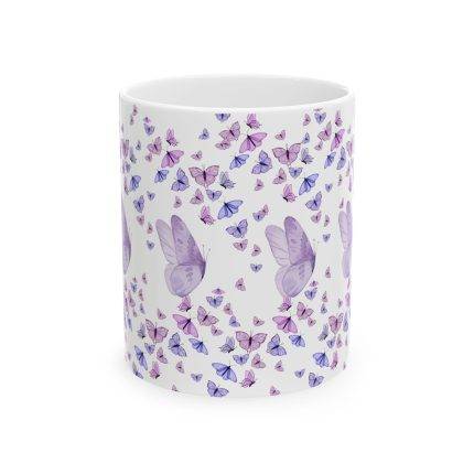 White ceramic mug with multiple purple butterflies surrounding the cup, featuring larger butterflies in the center.